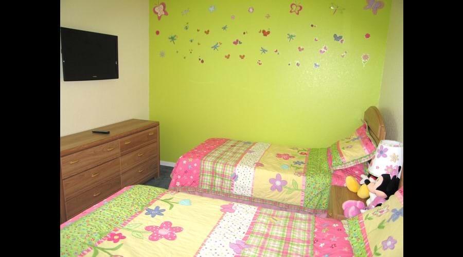 Girls Bedroom with Butterfly theme & 32" wall mounted TV